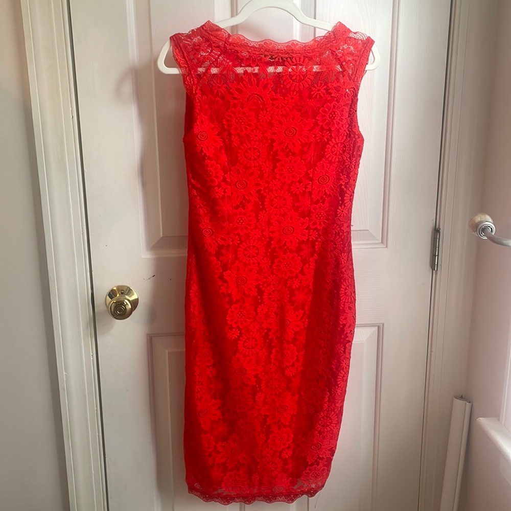 Beautiful red lace dress with stretch! Very comfortable and eye catching.